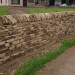 Cope stones on a dry stone wall