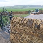 Dry stone wall and paving