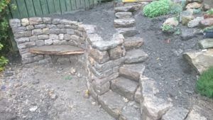 Stone and wood bench and steps