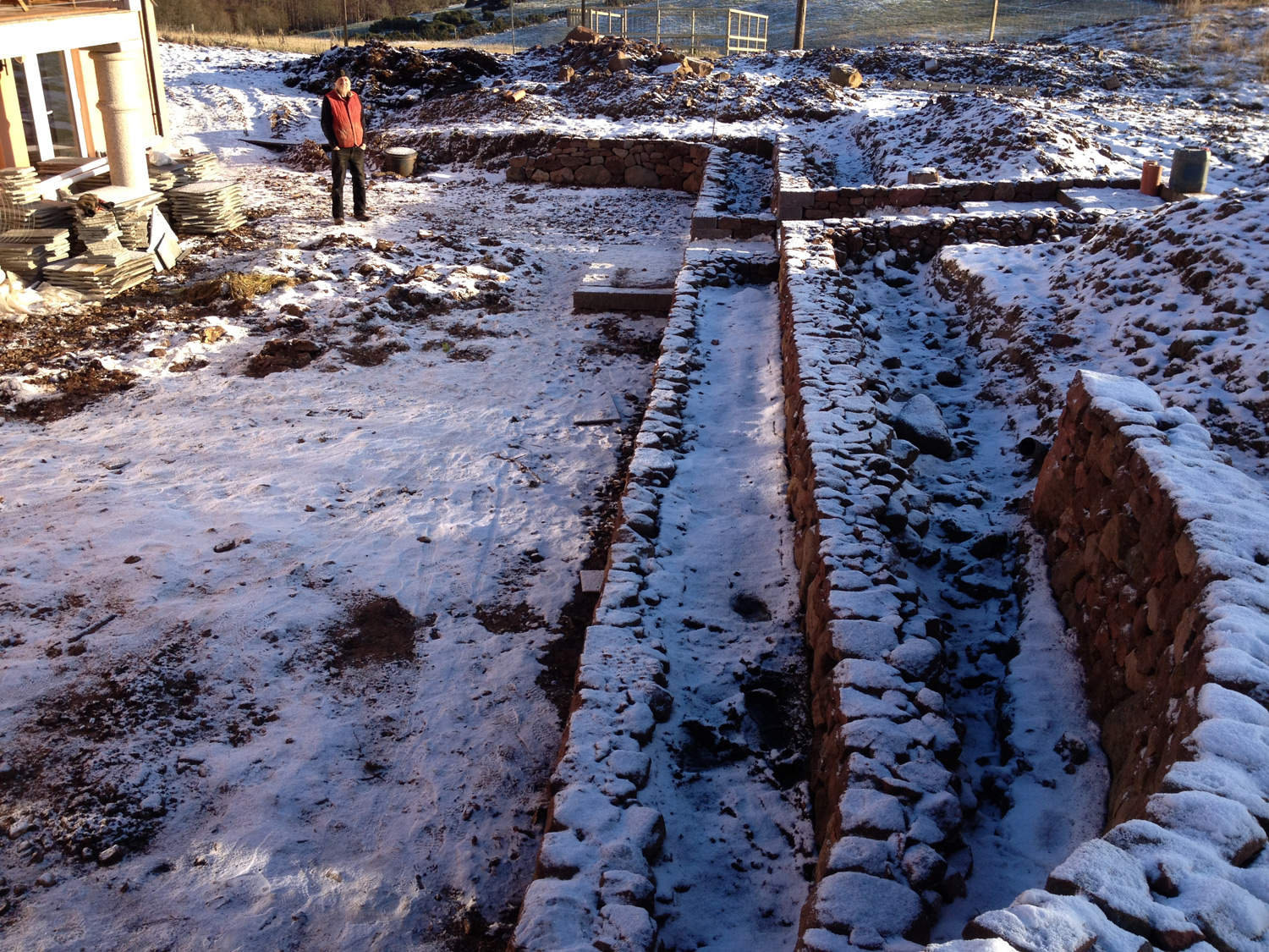 Dry stone retaining wall and terraces