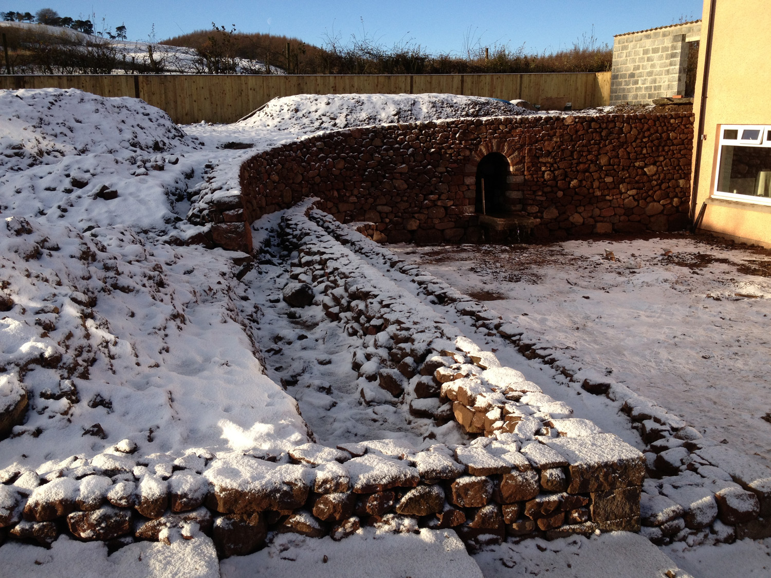 Dry stone retaining wall and terraces