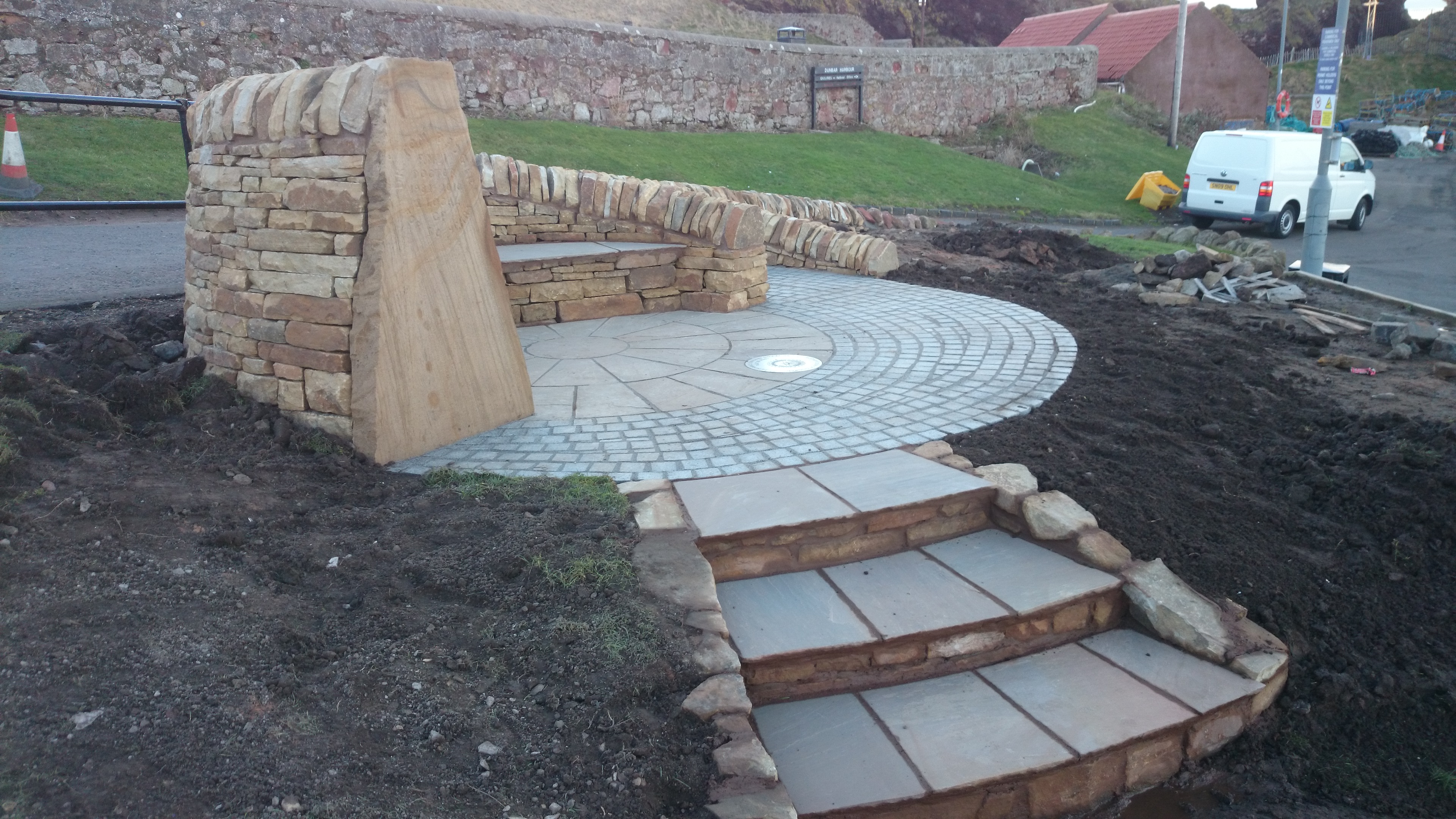 Dry stone bench and paving