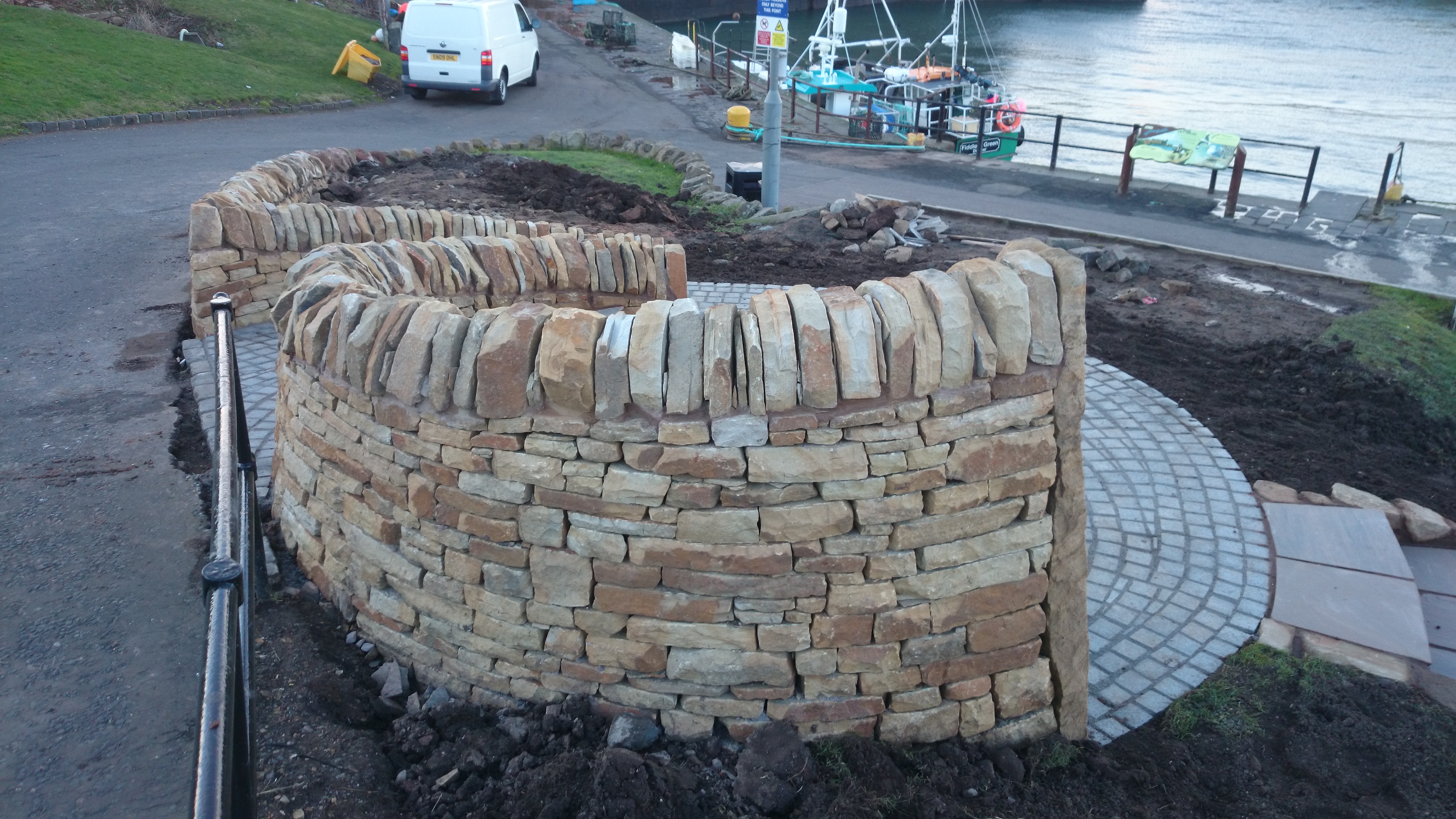 Dry stone bench and paving