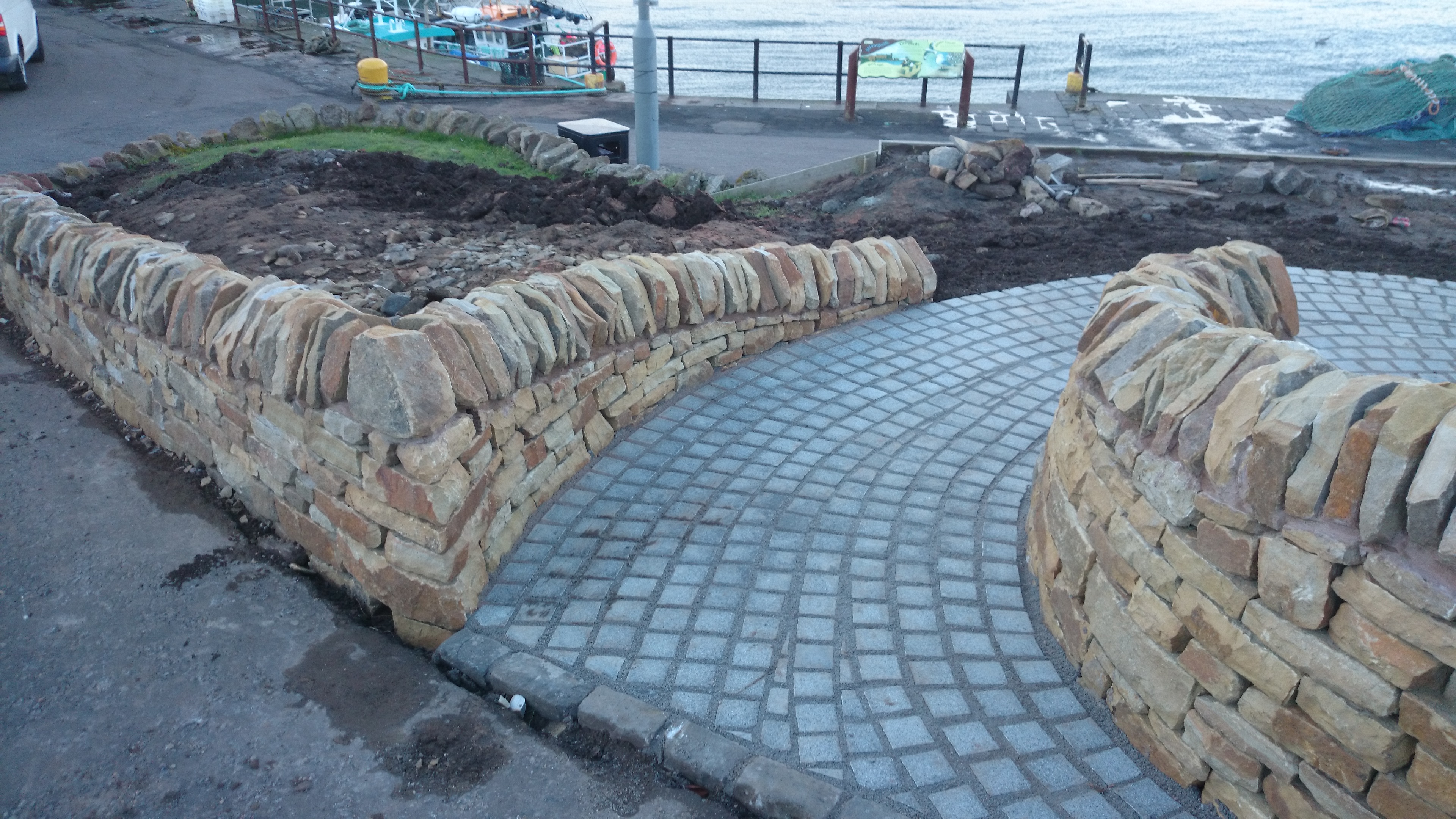 Dry stone bench and paving