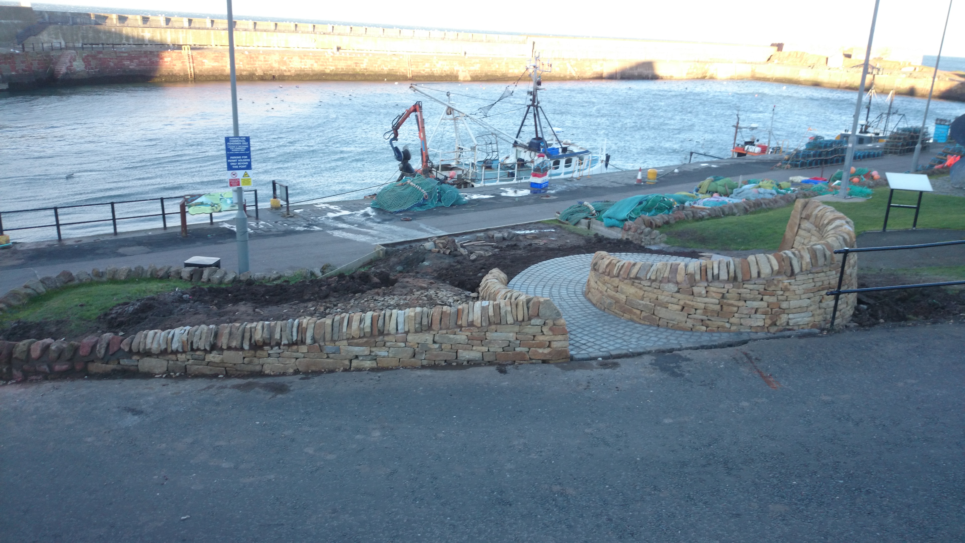 Dry stone bench and paving