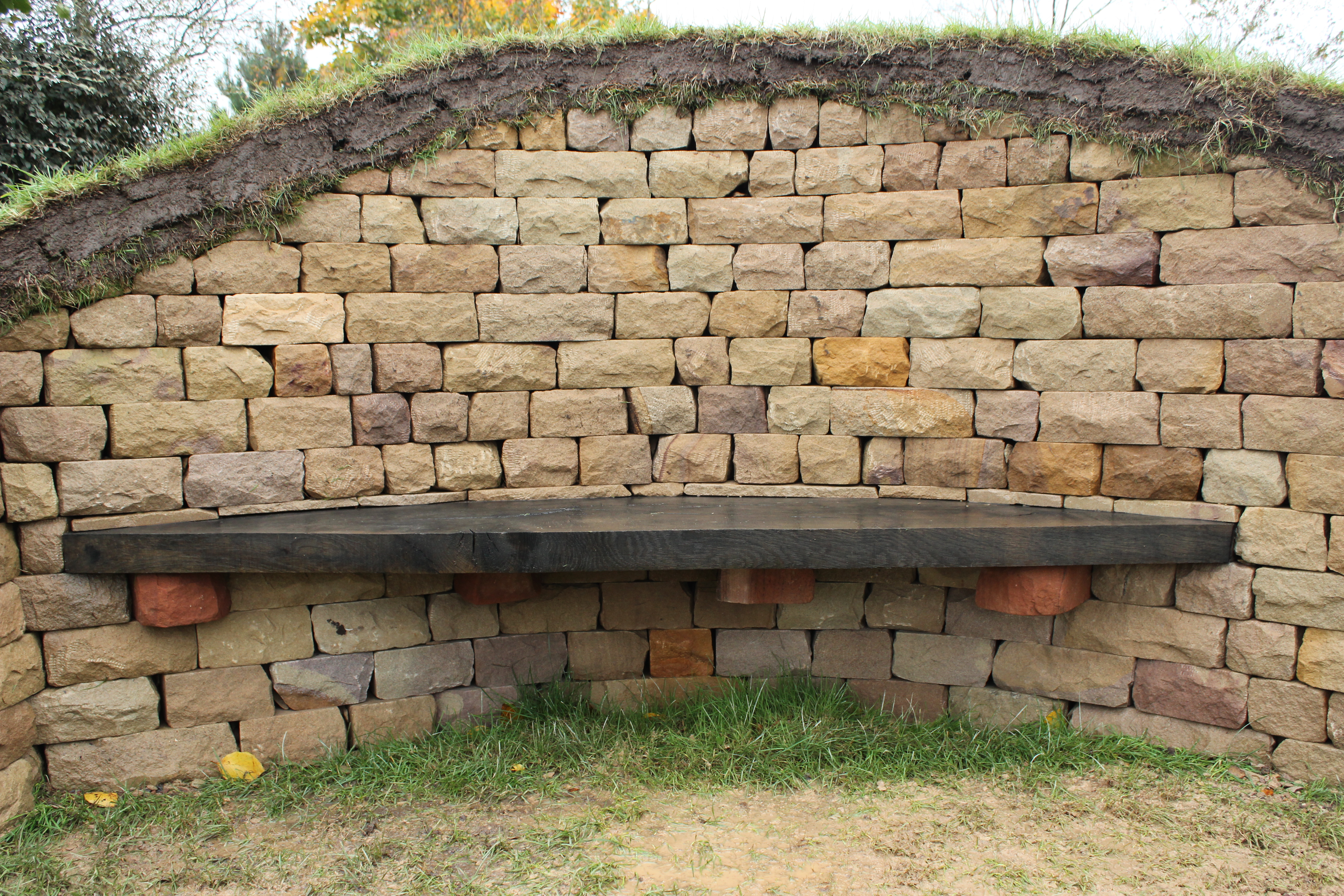 Dry stone, wood and turf bench