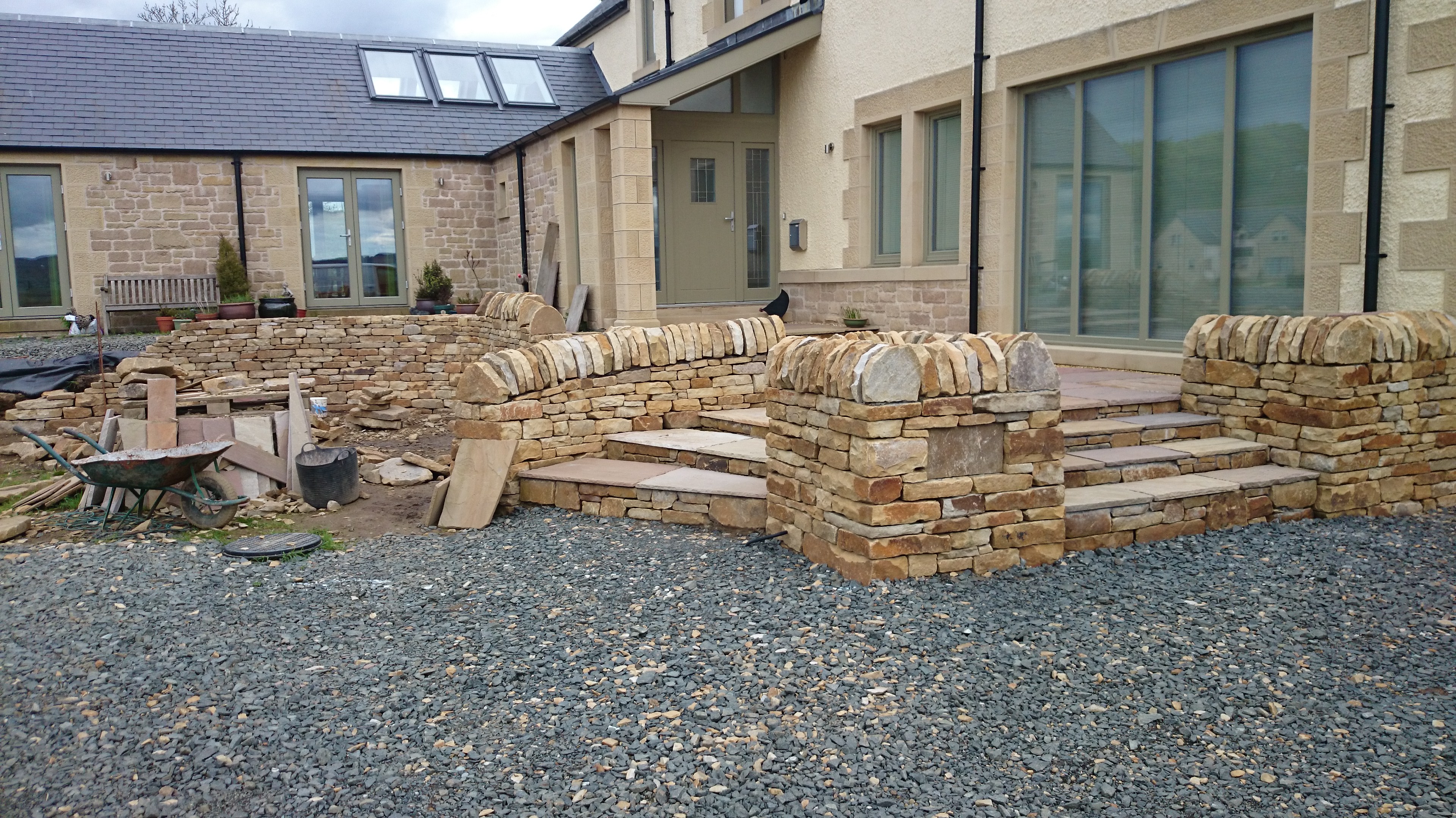 The dry stone wall under construction