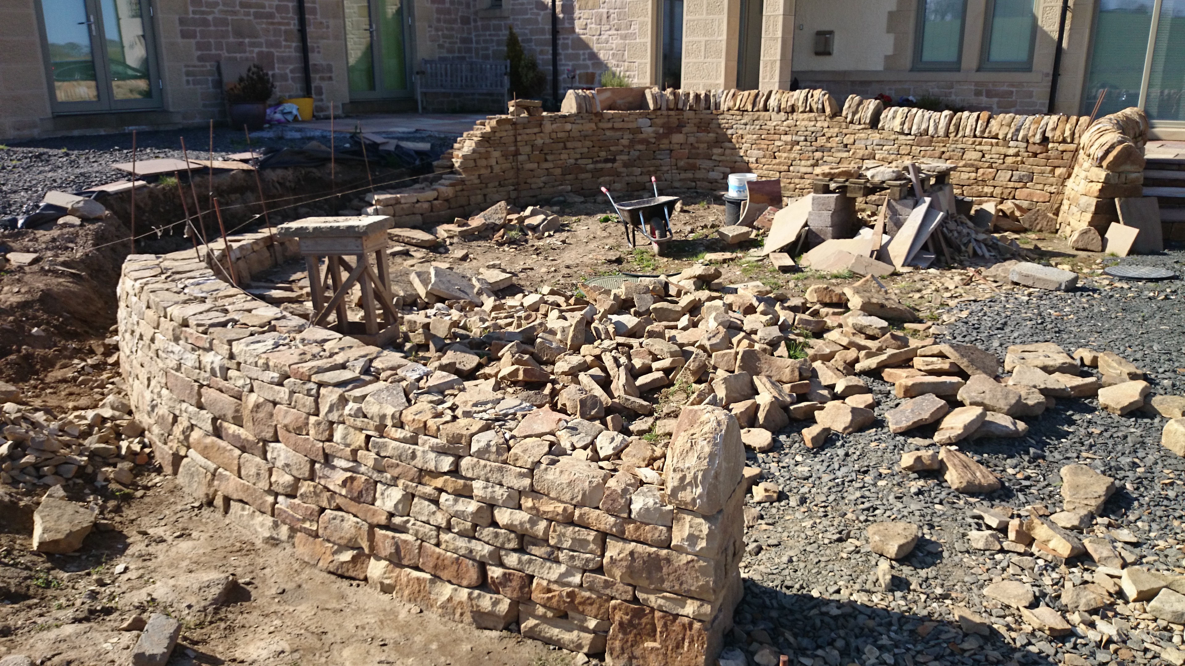 The dry stone wall under construction