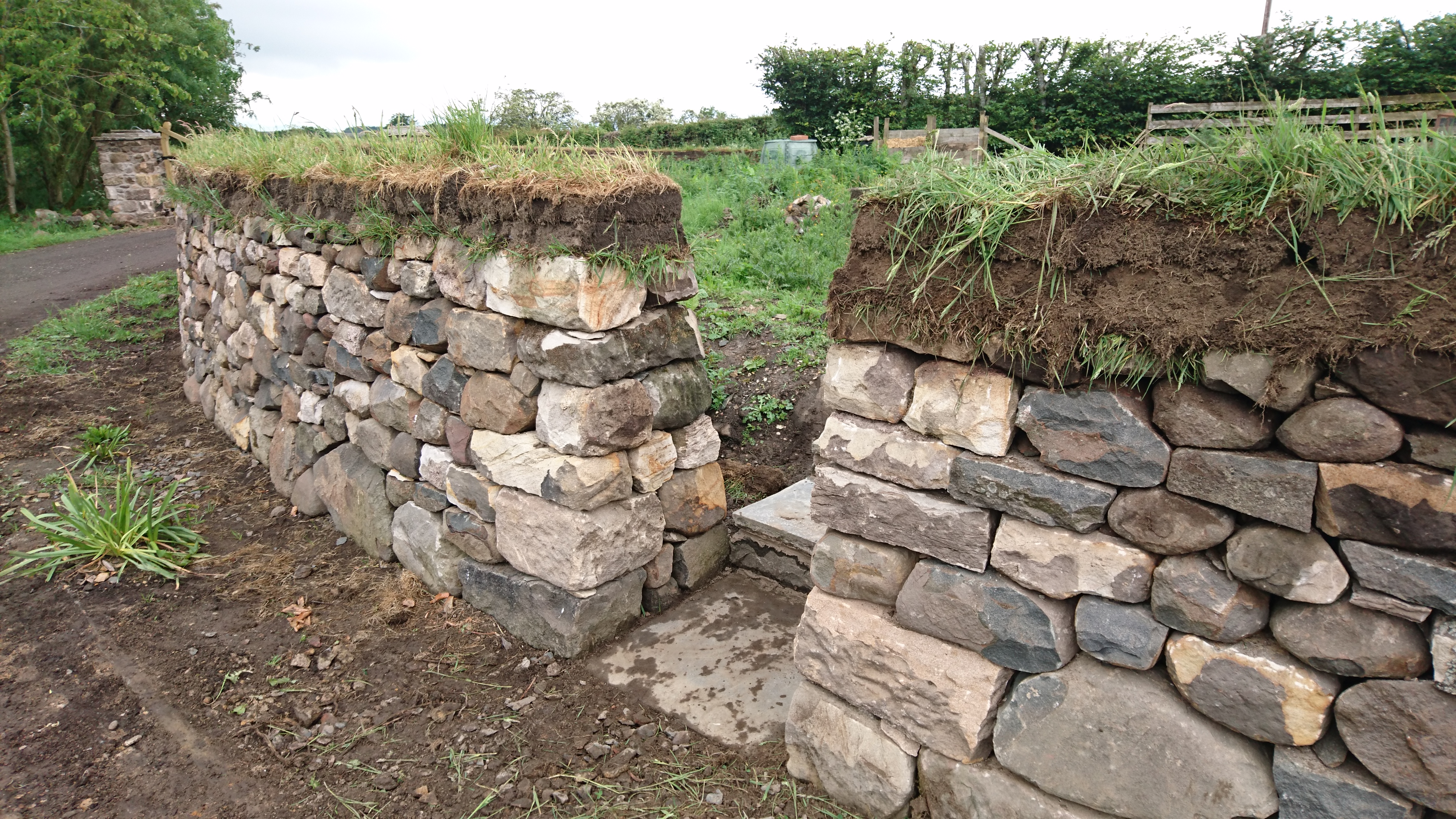 Dry stone wall with entrance