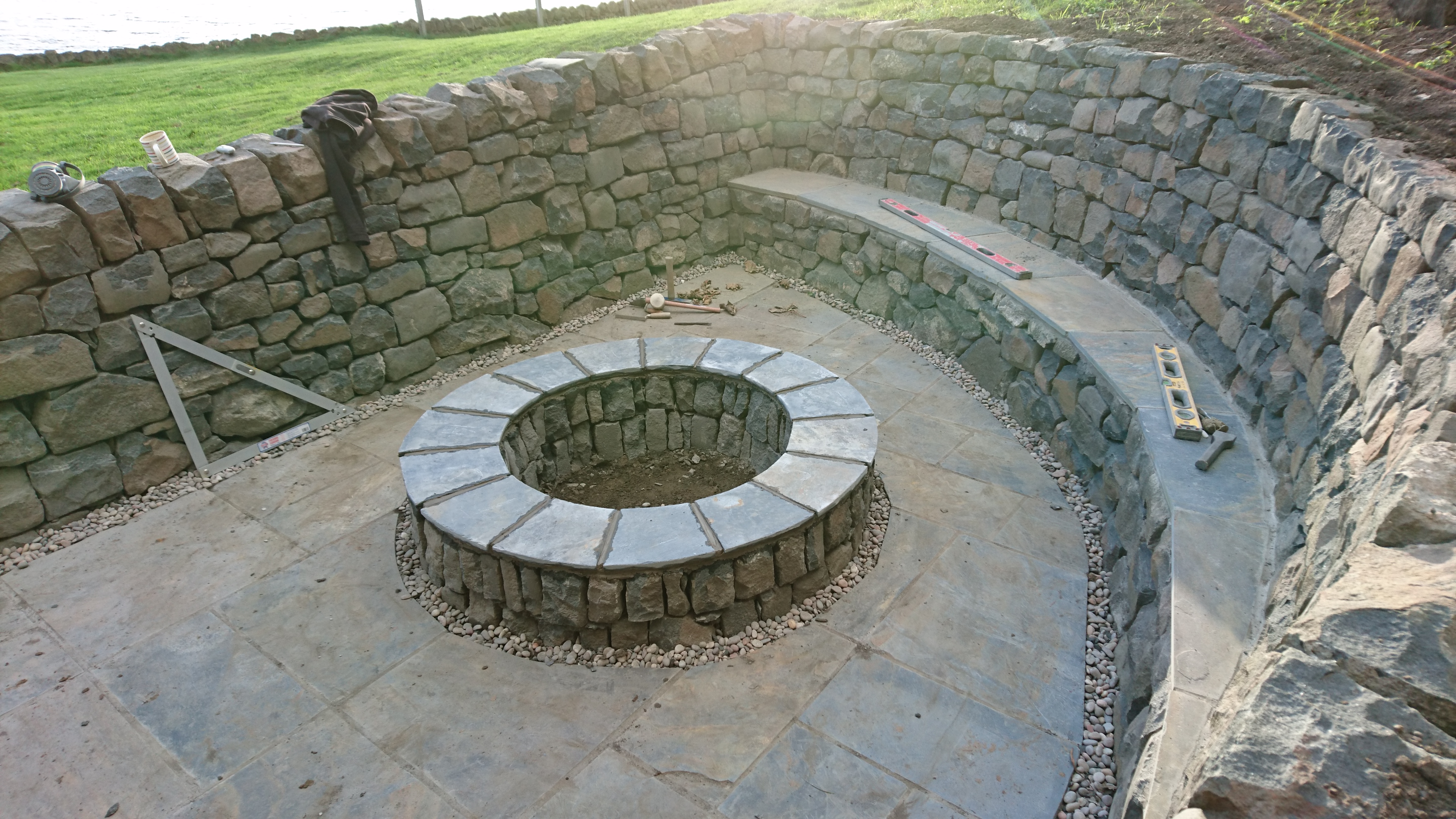 Dry stone seat and firepit