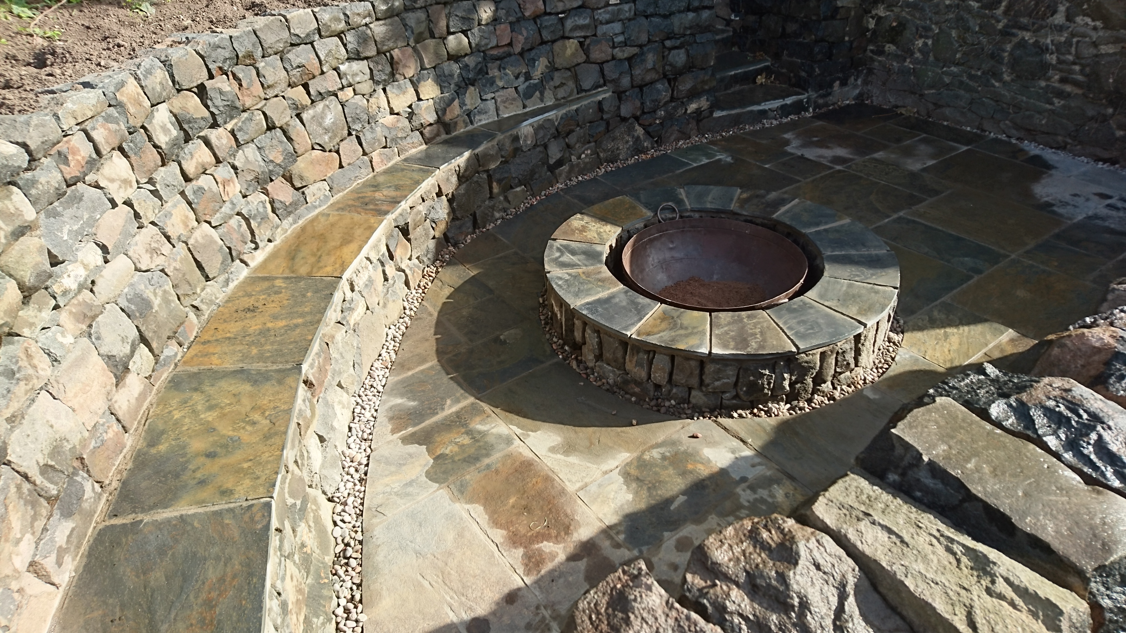 Dry stone bench and firepit