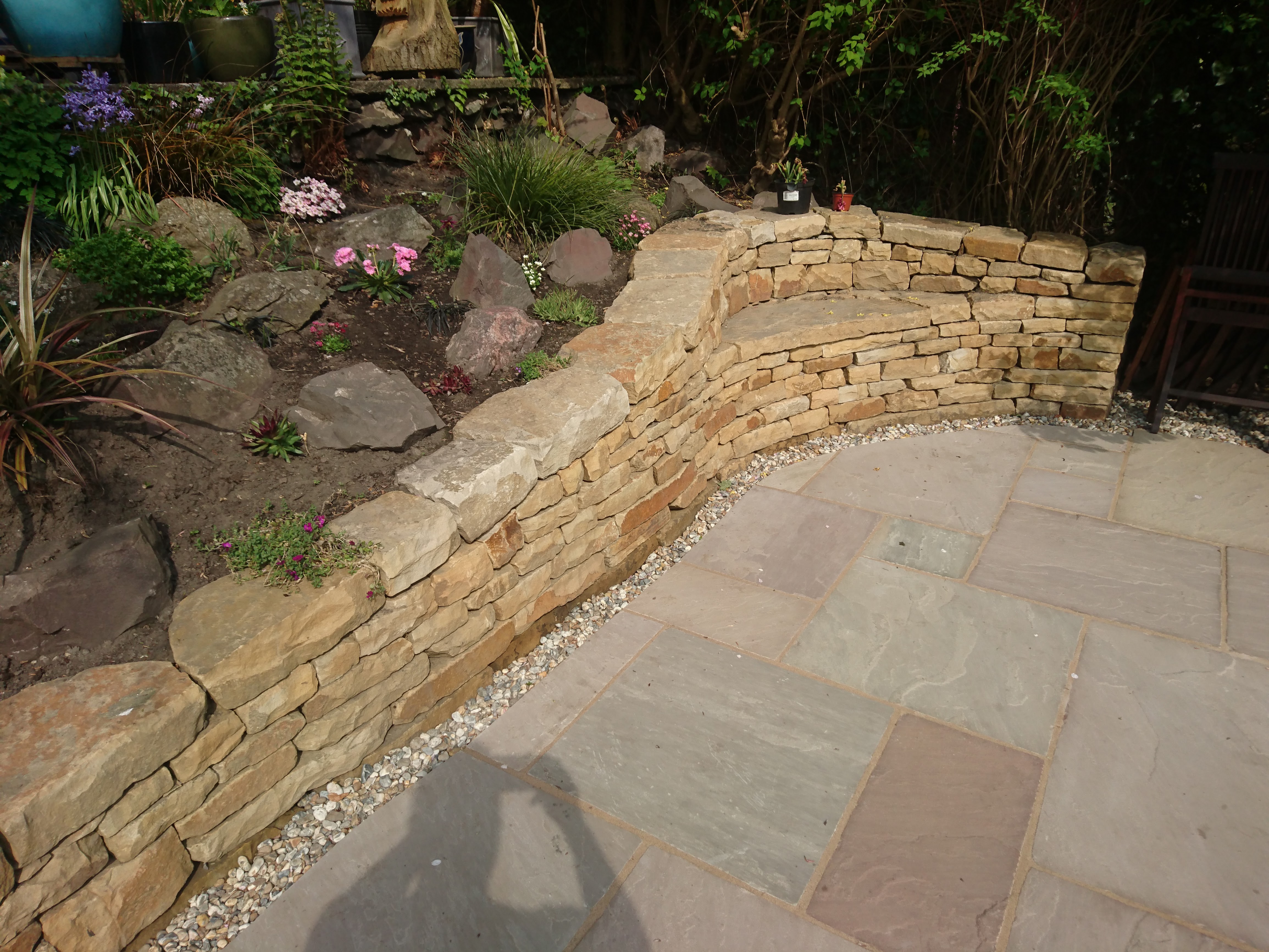 Dry stone bench and terraces