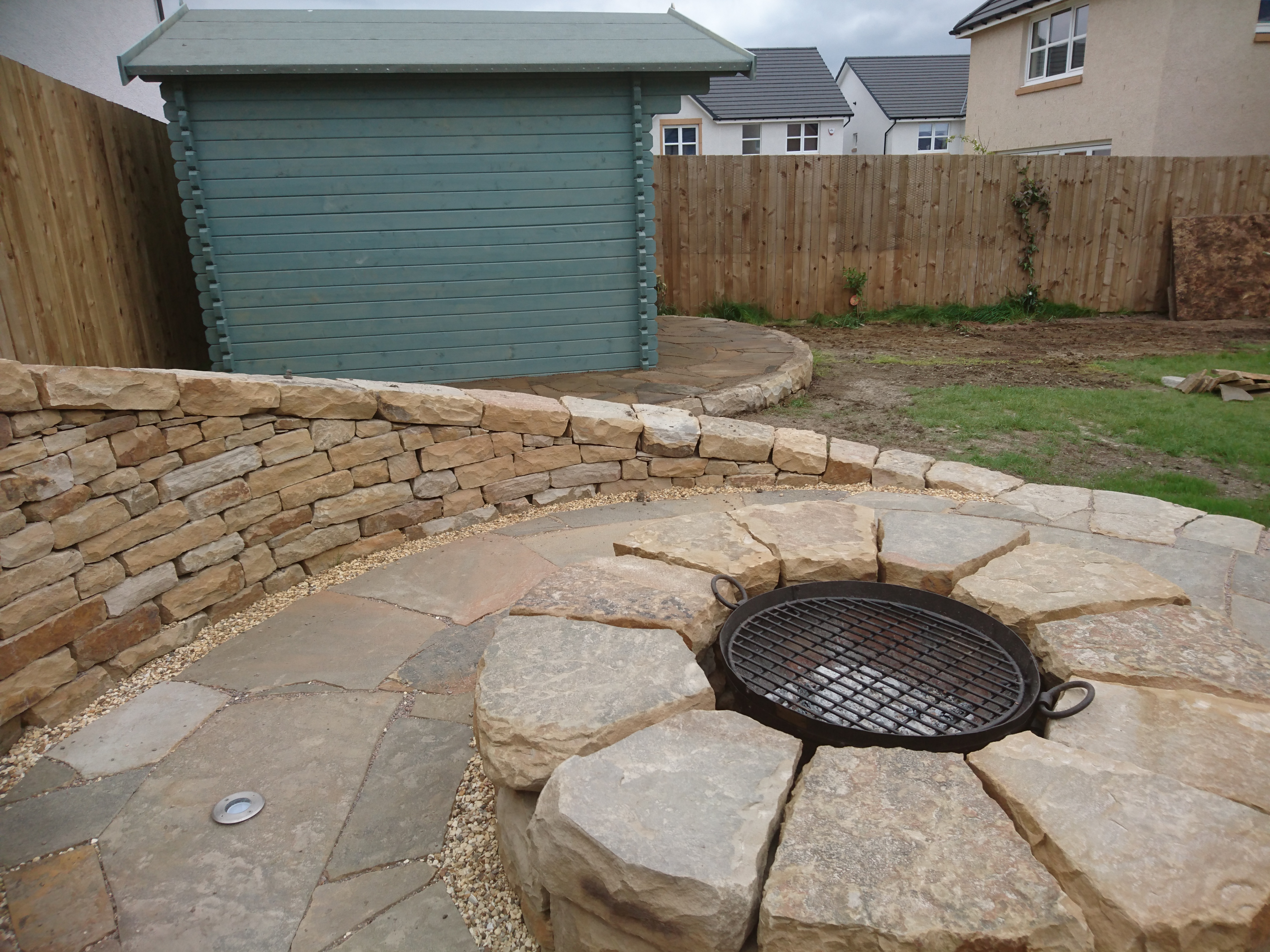 Dry stone bench and firepit