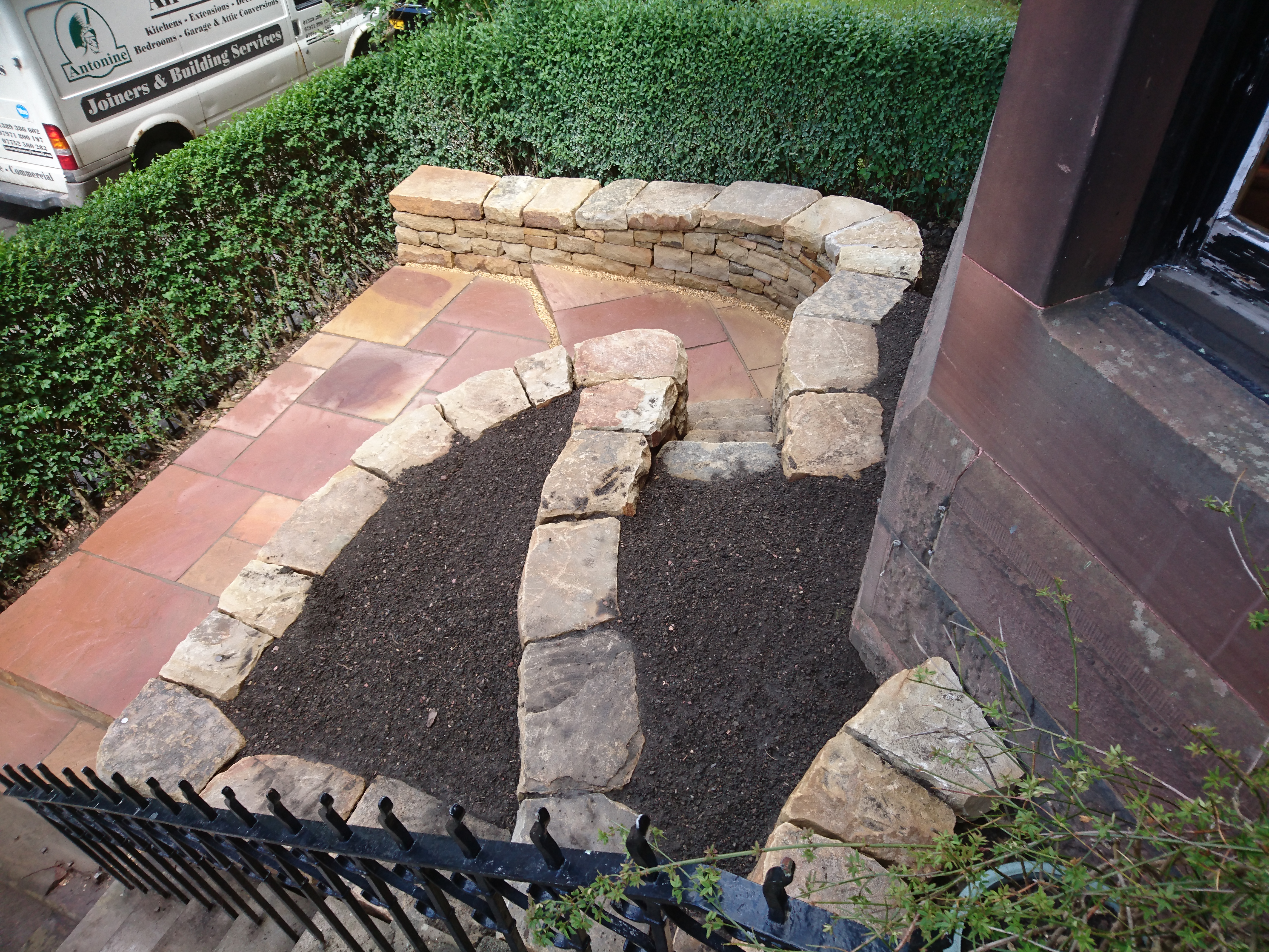 Steps, paving and retaining walls.