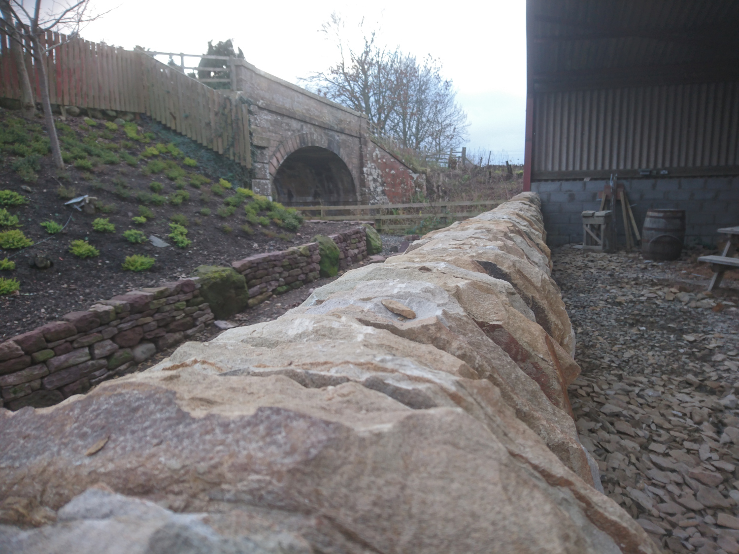 View along the top of the cope stones on a free standing dry stone wall