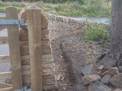 Curved drystone Entrance wall