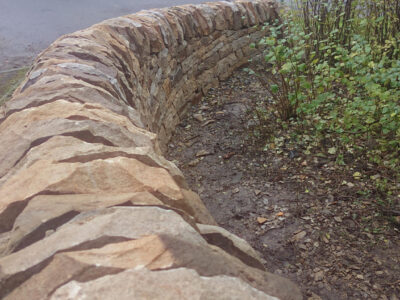 Curved drystone Entrance wall