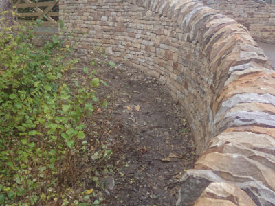 Curved drystone wall