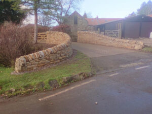 Big boulder and dry stone wall