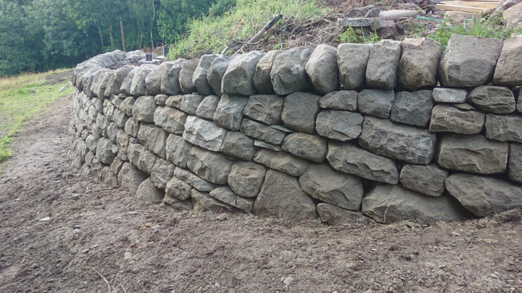 Dry stone retaining wall