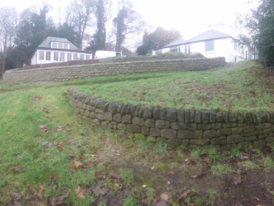 Dry stone retaining wall