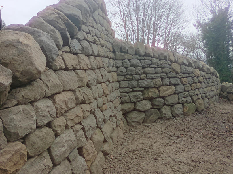 Dry stone retaining wall