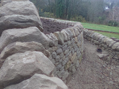 Dry stone retaining wall