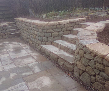 Dry stone retaining wall and steps