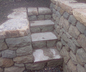 Dry stone retaining wall and steps