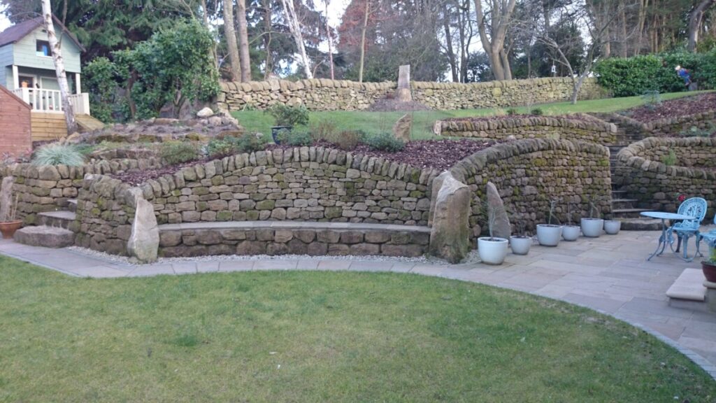 Edinburgh garden drystone retaining walls, bench and steps